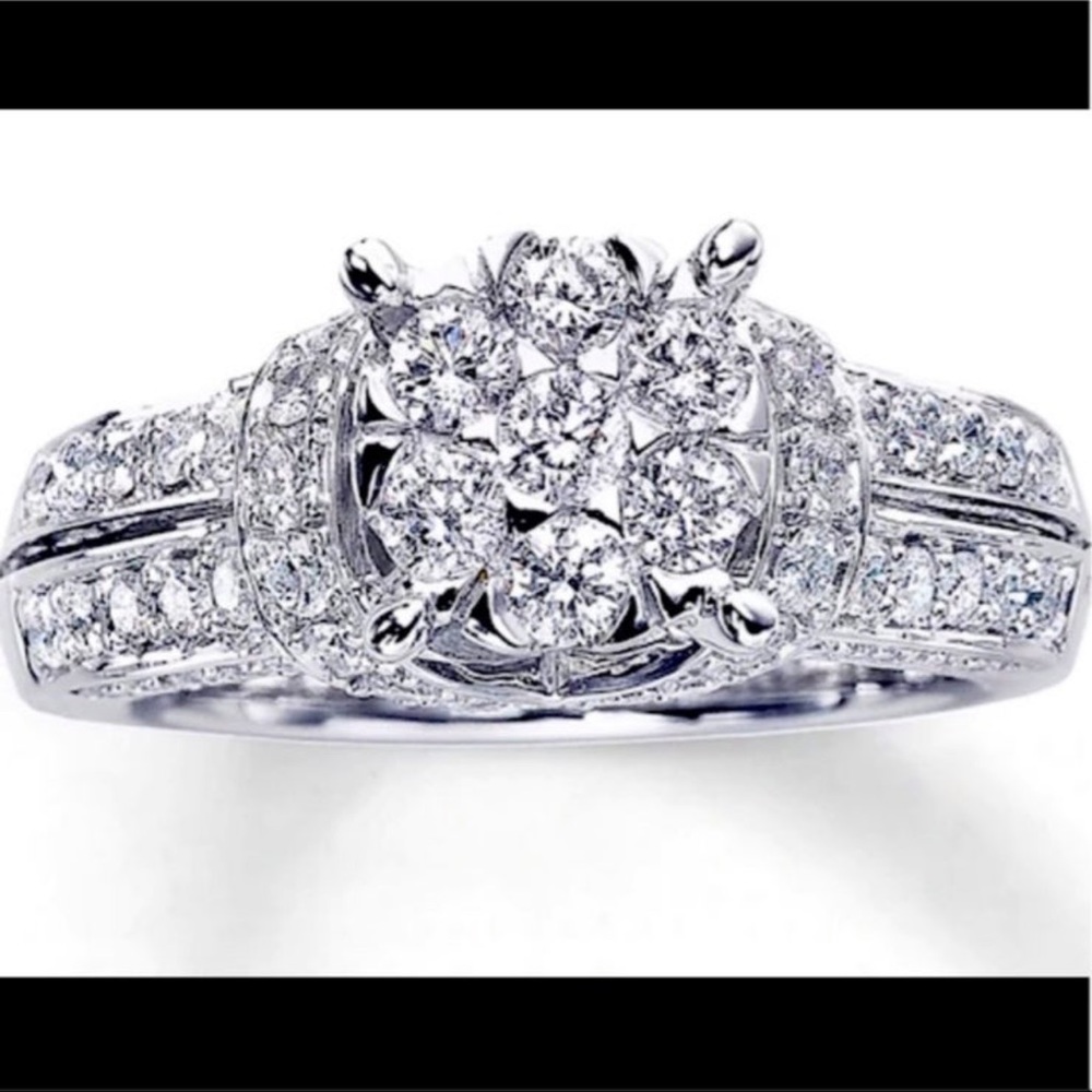 Round brilliant diamond engagement ring in 14k white gold size 7